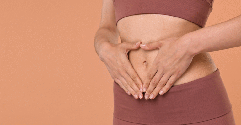 woman holding stomach